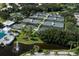 Aerial view of meticulously maintained tennis courts, offering residents an active and social lifestyle at 503 Clubside Cir # 47, Venice, FL 34293