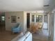 Bright dining area with wooden table and chairs set next to built in cabinets at 508 Vasto Dr, Venice, FL 34285