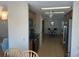 Kitchen has stainless steel appliances and wooden cabinetry with dark countertops at 508 Vasto Dr, Venice, FL 34285