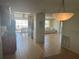 Open concept living space including the kitchen, dining area, sunroom, and living room at 508 Vasto Dr, Venice, FL 34285