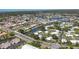 Expansive aerial view of a waterfront community with canals and well-maintained homes at 51 Oakwood N Dr # 51, Englewood, FL 34223