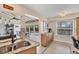 Bright kitchen with granite countertops, stainless steel sink, and ample natural light at 51 Oakwood N Dr # 51, Englewood, FL 34223