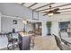 Cozy living space with a bar area, comfortable seating, and lots of natural light at 51 Oakwood N Dr # 51, Englewood, FL 34223