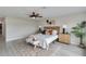 Comfortable bedroom with neutral colors, stylish decor, and plenty of natural light at 524 Lyons Bay Rd, Nokomis, FL 34275