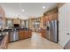 Modern kitchen overlooking a casual sitting area and stainless steel appliances at 5550 Rock Dove Dr, Sarasota, FL 34241