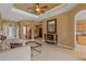 Inviting living area with tile flooring and seamless flow to kitchen and dining at 5550 Rock Dove Dr, Sarasota, FL 34241