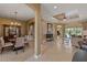 Spacious living area features tile floors, a dining area, and an open layout at 5550 Rock Dove Dr, Sarasota, FL 34241