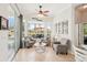 Inviting sunroom with tile floor, patio access, and picturesque views of the pool and backyard at 614 Pond Willow Ln, Venice, FL 34292