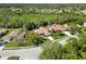 Suburban community with mature landscaping and close to natural wooded area at 7324 Links Ct, Sarasota, FL 34243