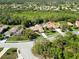 Suburban community with mature landscaping and close to natural wooded area at 7324 Links Ct, Sarasota, FL 34243