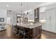 Gourmet kitchen with large island, stainless appliances, and custom cabinetry at 7324 Links Ct, Sarasota, FL 34243