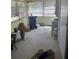 Interior laundry room with window and room for storage at 733 Roma Rd, Venice, FL 34285