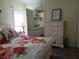 Comfortable bedroom featuring a doorway to a bathroom at 805 S Waterway, Venice, FL 34285