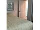 Cozy bedroom with a comfortable bed and framed art on the wall at 805 S Waterway, Venice, FL 34285