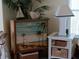 Bedroom featuring decorated dresser and side table with nautical theme at 805 S Waterway, Venice, FL 34285