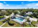 Stunning aerial view of a community pool and surrounding neighborhood at 915 Tartan Dr # 29, Venice, FL 34293