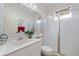 Bathroom features shower, toilet, and sink with mirrored cabinets at 915 Tartan Dr # 29, Venice, FL 34293