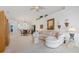 Bright living room with all white interior and stylish decor at 915 Tartan Dr # 29, Venice, FL 34293