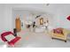 Bright living room with neutral tones, plush seating, and arched entryway for an elegant and comfortable ambiance at 915 Tartan Dr # 29, Venice, FL 34293