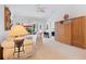 Bright and open living space featuring neutral decor, an open layout, and sliding glass doors at 915 Tartan Dr # 29, Venice, FL 34293
