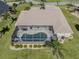 Aerial view of the home and pool. See how close the home is to all the surrounding neighborhoods and amenities at 9542 Spring Cir, Port Charlotte, FL 33981