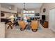 Bright living room with high ceilings, tile floors, and a seamless connection to the outdoor living space at 9542 Spring Cir, Port Charlotte, FL 33981