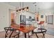 The dining room offers a smooth transition to the kitchen, which creates an inviting space for gatherings at 9800 Bright Water Dr, Englewood, FL 34223