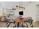 Open floor plan from the dining room to the living room and view to the lanai at 9800 Bright Water Dr, Englewood, FL 34223