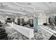 Contemporary gym with modern fitness equipment, natural light, and a motivational message at 9800 Bright Water Dr, Englewood, FL 34223
