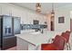 Beautiful kitchen with quartz countertops, stainless steel appliances and pendant lighting at 9800 Bright Water Dr, Englewood, FL 34223