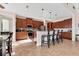 Spacious kitchen with stainless steel appliances, granite countertops, tile flooring and a breakfast bar at 10139 Kansas City St, Port Charlotte, FL 33981