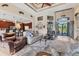 Spacious living room features tray ceilings, tile floors and an open floor plan at 10139 Kansas City St, Port Charlotte, FL 33981