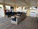 Relaxing covered patio with comfortable seating near community pool and common area at 109 Bayshore Rd # 10, Nokomis, FL 34275