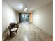 A versatile empty room with tile floors, ready for customization and personalization at 109 Bayshore Rd # 10, Nokomis, FL 34275