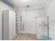 Spacious walk-in closet offering ample storage and organization with shelves and clothing racks at 109 Bayshore Rd # 10, Nokomis, FL 34275