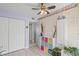 Bedroom featuring light wood flooring and ample storage space at 1555 Tarpon Center Dr # 255, Venice, FL 34285