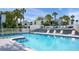 Inviting community pool with lots of seating for residents at 1555 Tarpon Center Dr # 255, Venice, FL 34285