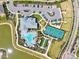 Aerial view of neighborhood amenities including pool, parking, tennis court and green spaces at 1606 Cedar Valley Dr, Port Charlotte, FL 33953