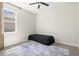 Bright bedroom featuring carpet, window, and ample natural lighting at 1606 Cedar Valley Dr, Port Charlotte, FL 33953