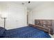 Comfortable bedroom with carpet, large closet, and view of hallway at 1606 Cedar Valley Dr, Port Charlotte, FL 33953