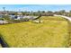Outdoor dog park featuring lush green grass, play structures, and secure fencing at 1606 Cedar Valley Dr, Port Charlotte, FL 33953