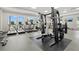 Bright fitness center filled with weightlifting equipment, treadmills, and flat-screen televisions at 1606 Cedar Valley Dr, Port Charlotte, FL 33953