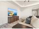 Comfortable living room with modern decor, a lake view and access to the entry at 1606 Cedar Valley Dr, Port Charlotte, FL 33953