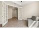 Bright office space with tile flooring, glass french doors and neutral decor at 1606 Cedar Valley Dr, Port Charlotte, FL 33953