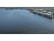 Aerial view showing waterfront condominiums, neighborhood, and a large body of water at 1750 Jamaica Way # 322, Punta Gorda, FL 33950