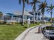 Pathway leading along the dock area featuring gorgeous landscaping and waterfront views at 1750 Jamaica Way # 322, Punta Gorda, FL 33950