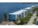 Exterior view of a coastal condominium with balconies overlooking the water at 1750 Jamaica Way # 322, Punta Gorda, FL 33950