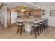 Spacious kitchen with granite counters, an island, wood cabinets and stainless steel appliances at 1750 Jamaica Way # 322, Punta Gorda, FL 33950