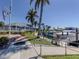 Lush tropical landscaping along the marina with boat docks and convenient access at 1750 Jamaica Way # 322, Punta Gorda, FL 33950