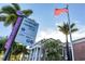 Fishermen's Village sign highlights the historic district near City Hall, adorned with palms and an American flag at 1750 Jamaica Way # 322, Punta Gorda, FL 33950